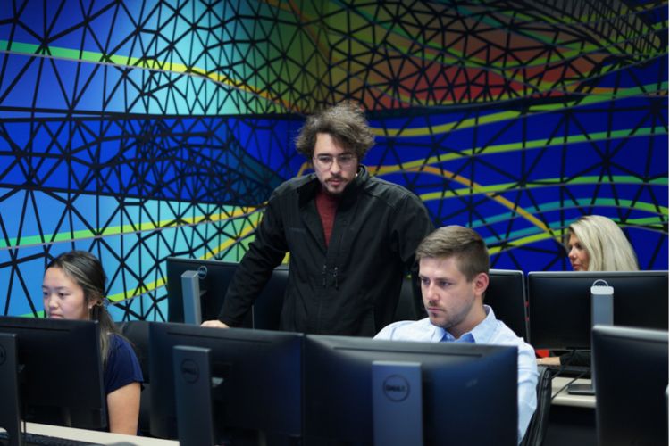 People on computer in a classroom